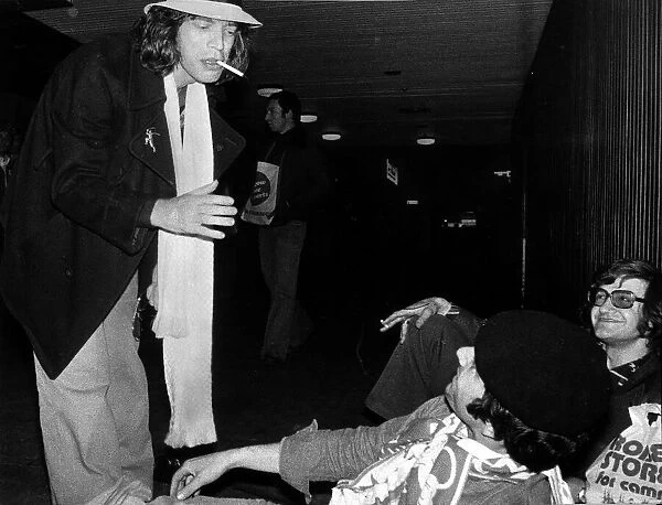Rolling Stones: Mick Jagger at Glasgow Airport talking to fans. Circa 1972
