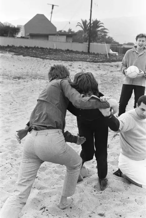Framed Print : The Rolling Stones. Mick Jagger and manager Andrew Loog Oldham seen here wrestling