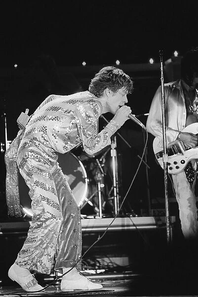 The Rolling Stones. Mick Jagger sings on stage with the Stones during a concert at
