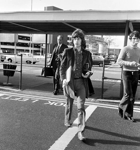 Rolling Stones pop group lead singer Mick Jagger pictured on arrival at London