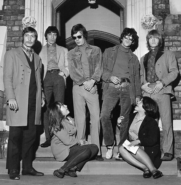 The Rolling Stones posing outside their Manchester Hotel