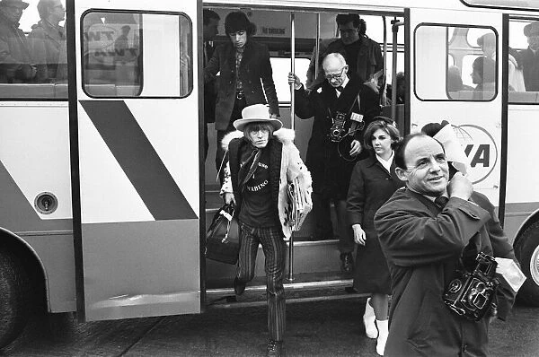 The Rolling Stones seen here at London Airport embarking on a flight to New York