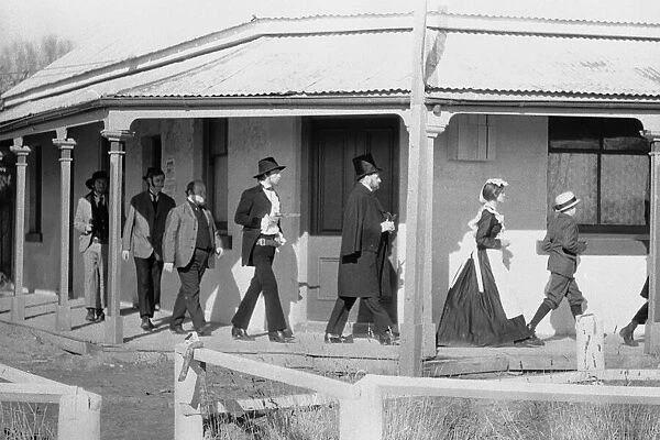 Rolling Stones singer Mick Jagger as Ned Kelly marching hostages around the veranda of