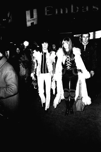 Rolling Stones: Bill Wyman & his girlfriend Astrid arrive at Newcastle Central Station