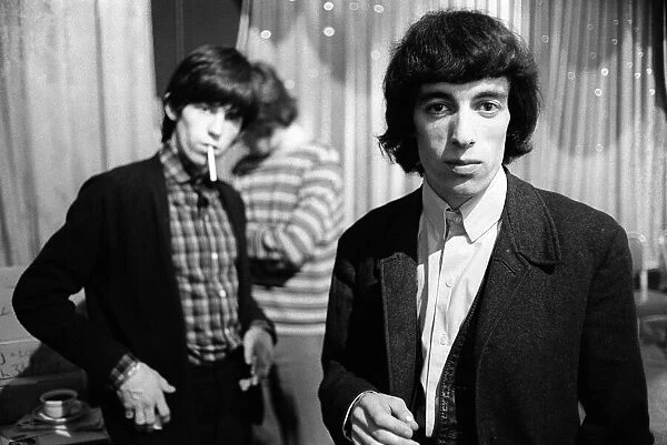 Rolling Stones: Bill Wyman and Keith Richards at a press conference after arriving in