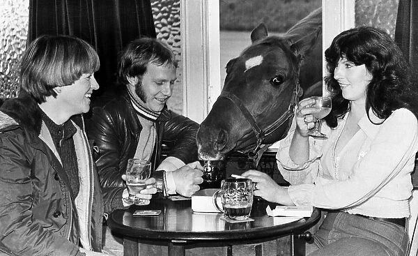 Roman Crumpet the Drinking horse shares a pint with his owners 1977
