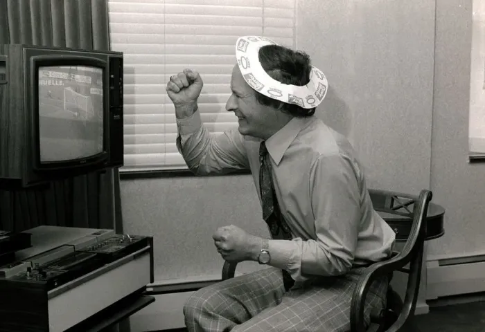 Framed Print : Romark - Hypnotist  /  Magician - 1976 watching a football match on television