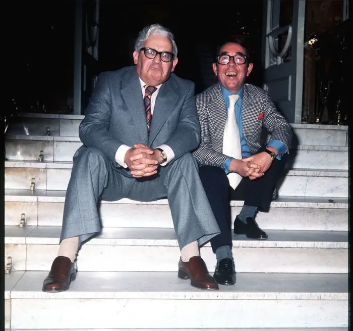 Framed Print : Ronnie Barker with Ronnie Corbett sitting on the steps outside the building Framed Print : Ronnie Barker with Ronnie Corbett sitting on the steps outside the building