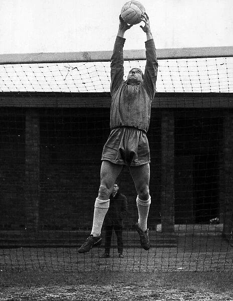 Ronnie Simpson goalkeeper jumping to catch football at goalmouth Circa 1967