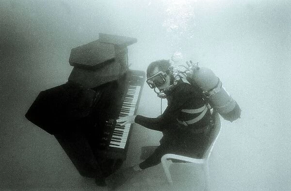 Ronnie Smith from Harrow Middlesex playing the piano underwater july 1982
