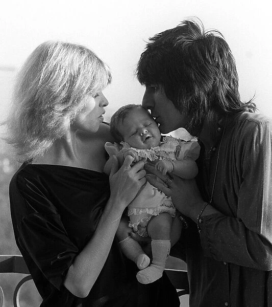 Ronnie Wood with his wife former model Jo Howard and their baby daughter Leah aged five