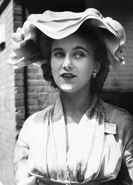 Rosamund Lowry from Ireland at Royal Ascot in June 1952 Marguerite hat