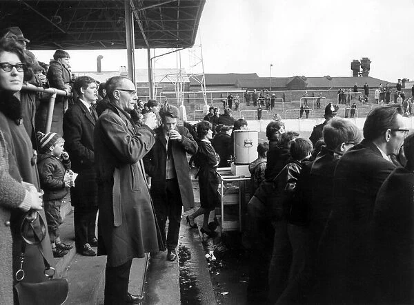 Rotherham Football Club. Supporters buying tea from an Urn in the stands