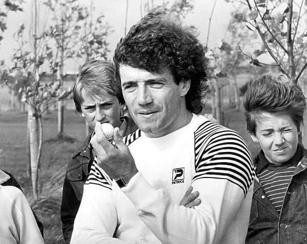 Rough luck, Kevin Keegan prepares to play a drop-ball after hooking into the trees