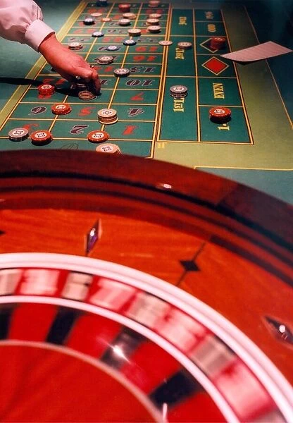A roulette table and wheel
