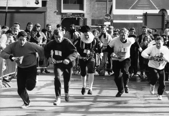 Framed Print : The Row and Flea Market Pancake Race around the stalls of the market in Birmingham City Framed Print : The Row and Flea Market Pancake Race around the stalls of the market in Birmingham City