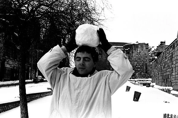 Rowan Atkinson during a flying a visit to Newcastle - having fun in the snow 14  /  01  /  87