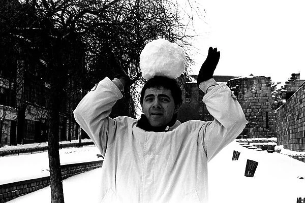 Rowan Atkinson during a flying a visit to Newcastle - having fun in the snow 14  /  01  /  87