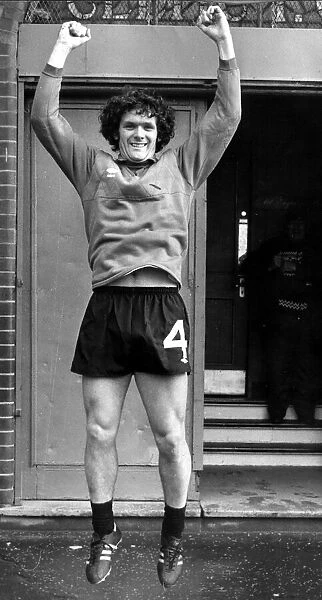 Roy Aitken jumping in the air outside Celtic Park October 1980
