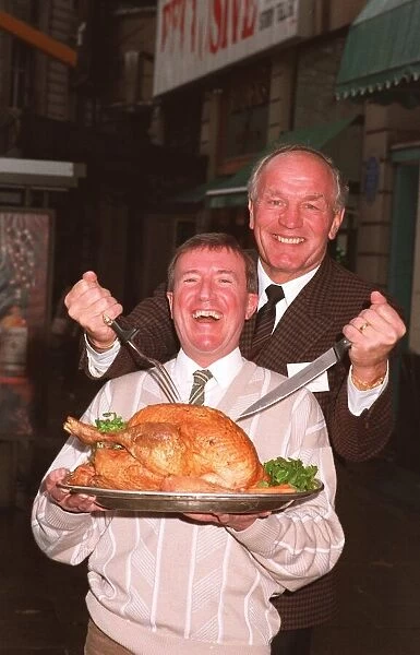 ROY CASTLE AND HENRY COOPER WITH A CHRISTMAS TURKEY - 12  /  12  /  1989