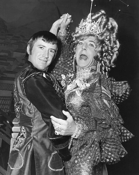 Roy Castle (left) as Wishee Washee, and Norman Vaughan as the Widow Trankey