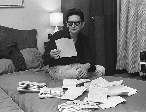 Roy Orbison America singer looks through the letters March 1967 from people