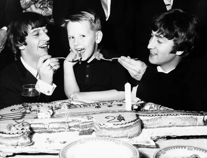 Framed Print : Roy Orbison s, son Roy Jr. being fed cake by John Lennon and Ringo Starr Framed Print : Roy Orbison s, son Roy Jr. being fed cake by John Lennon and Ringo Starr