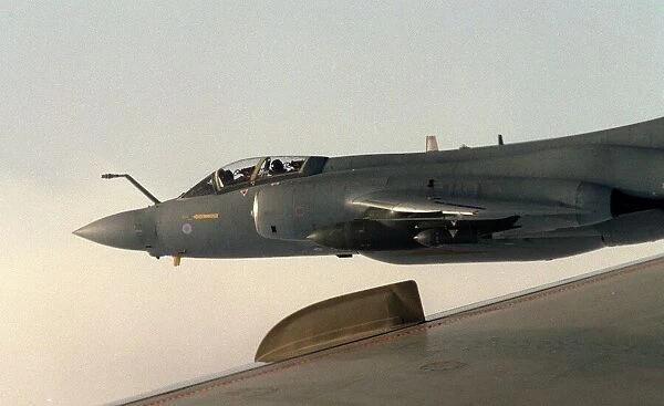 A Royal Air Force BAe Buccaneer S2B of 12 Squadron breaks away after refueling his