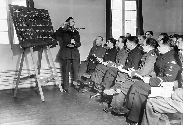 A Royal Air Force class for allied solders. The teacher holds up a plane