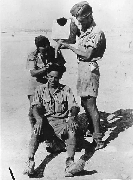 Royal Air Force (RAF) man getting a hair shampoo in Malta