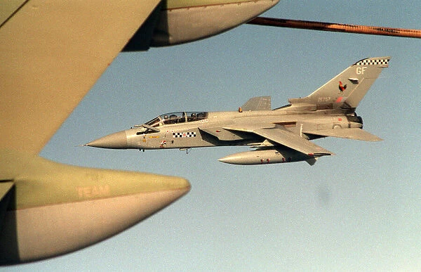 A Royal Air Force Tornado F3 of 43 Squadron extends his refueling probe as he prepares to