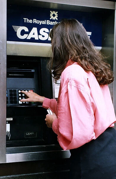 The Royal Bank of Scotland ATM Machine Woman pictured using cashline machine