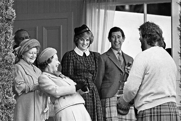 The Royal family share a joke with Geoff Capes as they attend the Braemar Highland Games