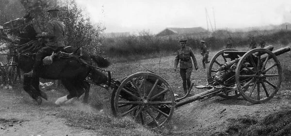 Royal Field Artillery team crossing a ditch as they move their guns in to position in
