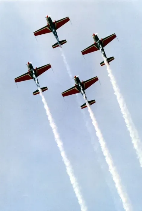 Framed Print : Royal Jordanian Falcons display team performing in their Extra EA300 aircraft Framed Print : Royal Jordanian Falcons display team performing in their Extra EA300 aircraft