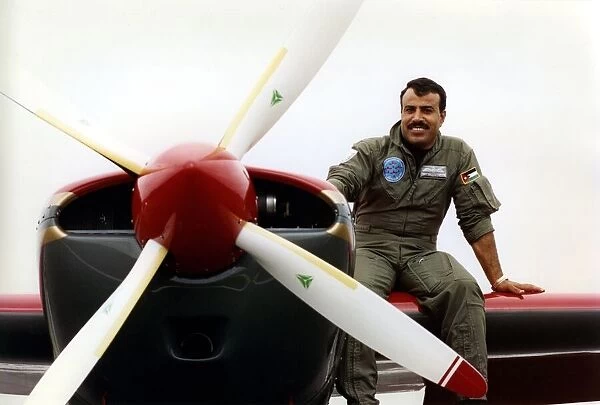 Royal Jordanian Falcons pilot Captain Tayseer Daboubi takes a break with his Extra EA300
