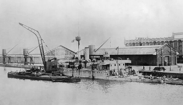 One of the Royal Navy Humber class river monitors seen here tied up to the quayside in