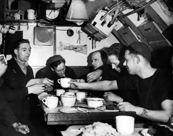 Framed Print : Royal Navy at War. Members of the crew gather in the submarine mess room Framed Print : Royal Navy at War. Members of the crew gather in the submarine mess room