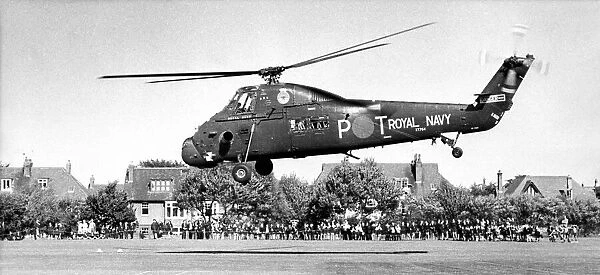 A Royal Navy Westland Wessex helicopter gives a demonstration to the pupils of Monkseaton