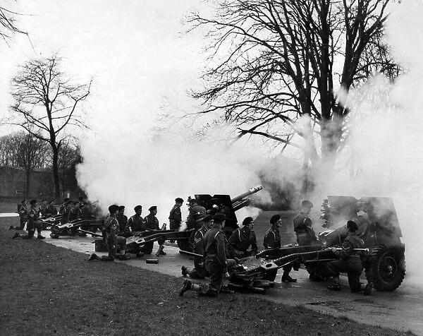 A Royal Salute of 21 guns is fired by the 281 Glamorgan Yeomanry Field Regiment, R. A. (T