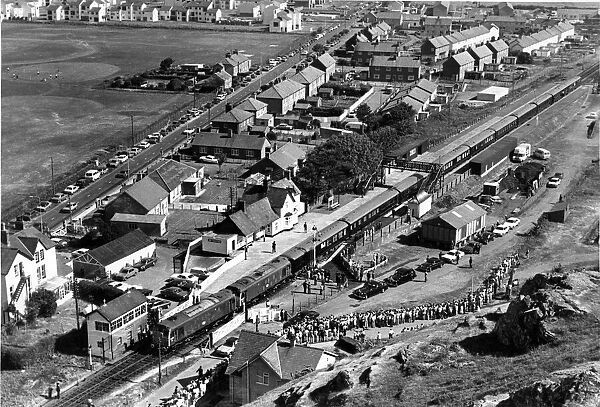 The Royal train pulls into Harlech station. Picture taken from The Ramparts of
