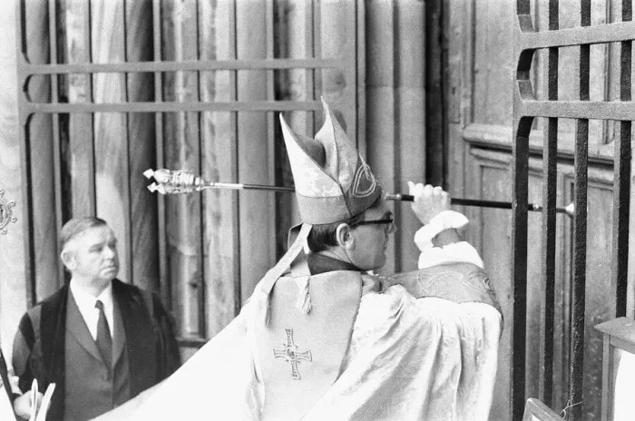 Framed Print : The Rt Revd Dr John Habgood the Bishop of Durham strikes the doors of the Cathedral with Framed Print : The Rt Revd Dr John Habgood the Bishop of Durham strikes the doors of the Cathedral with