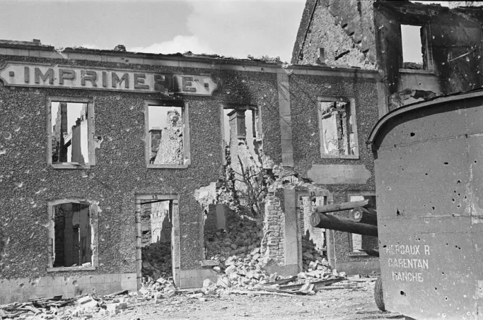 Framed Print : Ruined buildings and wrecked German transport in the streets of Montebourg as a result of Framed Print : Ruined buildings and wrecked German transport in the streets of Montebourg as a result of