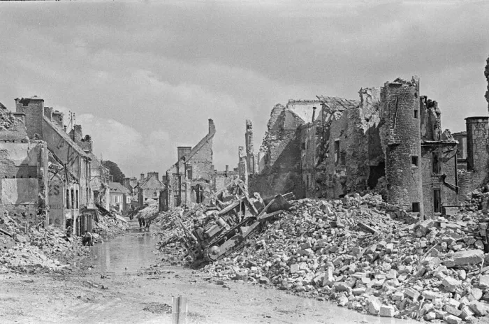 Framed Print : Ruined buildings and wrecked German transport in the streets of Montebourg as a result of Framed Print : Ruined buildings and wrecked German transport in the streets of Montebourg as a result of