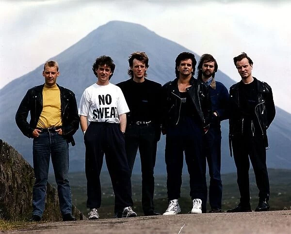 Runrig folk Gaelic celtic rock group standing in front of mountain circa 1990