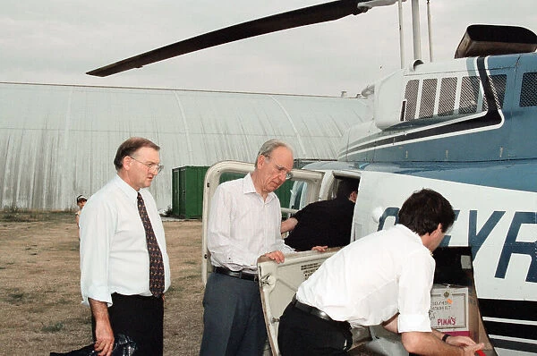 Rupert Murdoch getting in to a helicopter. 6th August 1994