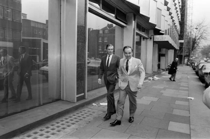 Framed Print : Rupert Murdoch leaving The Times building, Grans Inn Road, London. 20th February 1982