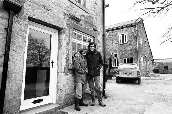 Russell Harty & close friend Madge Hindle, pictured at their farm house near the market