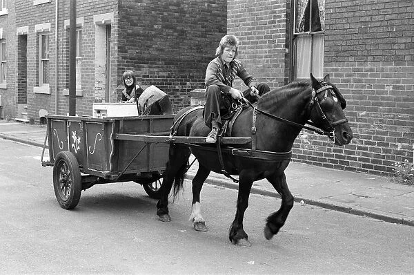 Russell Woods, Rag and bone boy in a residential street. 18th July 1975