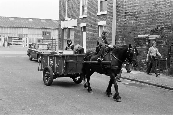 Russell Woods, Rag and bone boy in a residential street. 18th July 1975